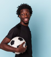 Portrait of Ryan holding a soccer ball